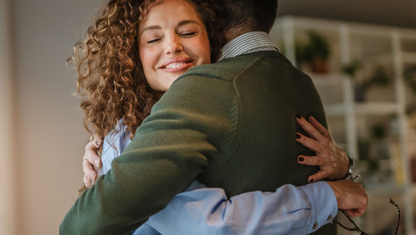 A couple embracing during their the Woodlands IVF journey